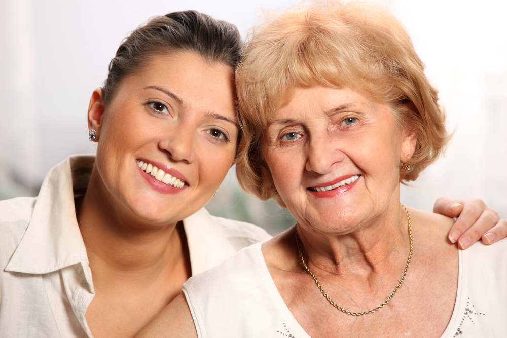 daughter and mom smiling